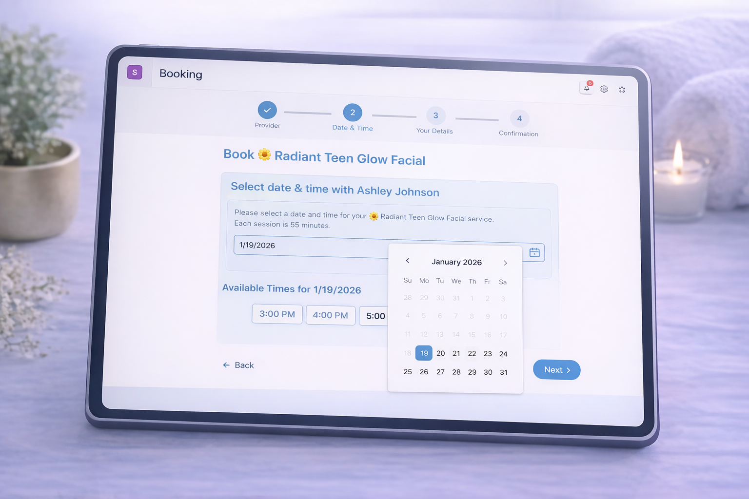 SpaSphere online booking interface showing service selection and calendar